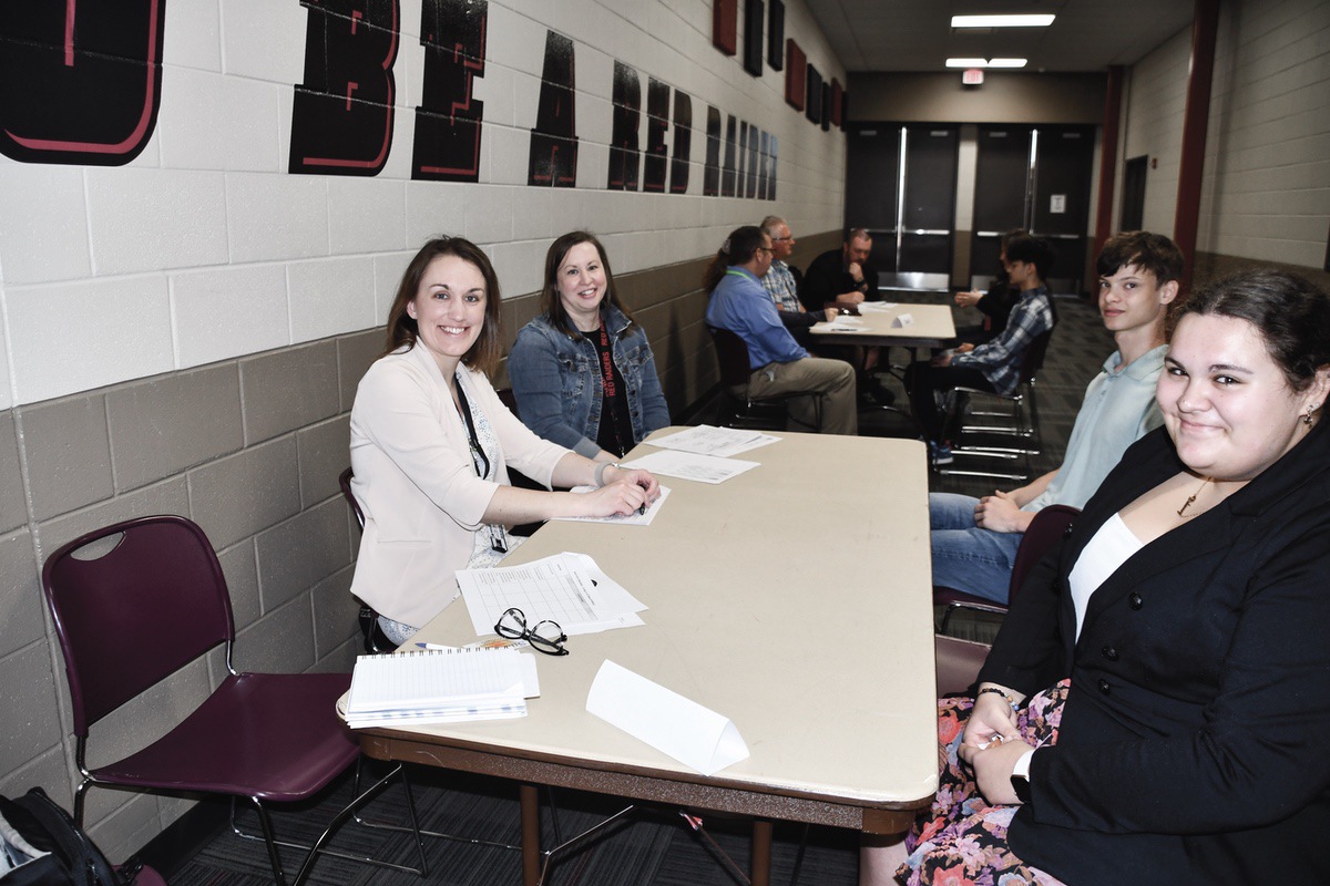 Director of Curriculum and Instruction Dr. Meghan Bagby (front left) and Project Lead The Way Engineering Instructor Amanda Hank (back left) conduct student interviews for Huntley High School Engineering Program with Cole Galloway and Delaney Gross. (Photo by Christine Such/My Sun Day News)