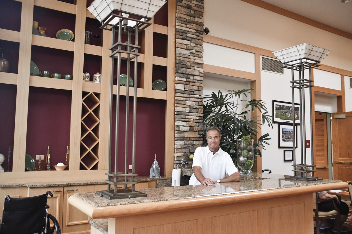 Sun City resident Mike Ciffone stands behind the Refreshment bar hoping residents will come together to save “an architectural gem.” (Photo by Christine Such/My Sun Day News)