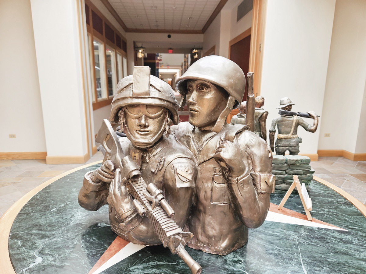 Sun city resident and sculptor Gerald Tarpey says the figures in his sculptures represent real heros and are based off real people who fought in numerous wars. You can see Tarpey’s sculptures in Prairie Lodge outsie the clayground room. (Photos by Christine Such/My Sun Day News)