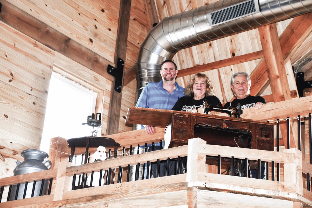 (L to R) Eric Forry, Nancy Fontana, and Duane Fontana up in the loft of their barn near the relics from the family past. (Photos by Christine Such/My Sun Day News)