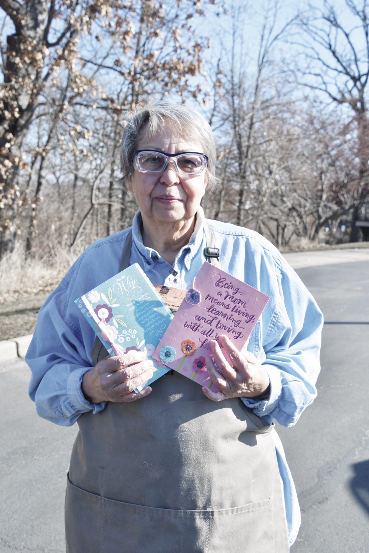Donna Bordsen uses old greeting cards for craft projects to help developmentally delayed individuals. She is accepting donations of old greeting cards. (Photo by Christine Such/My Sun Day News)