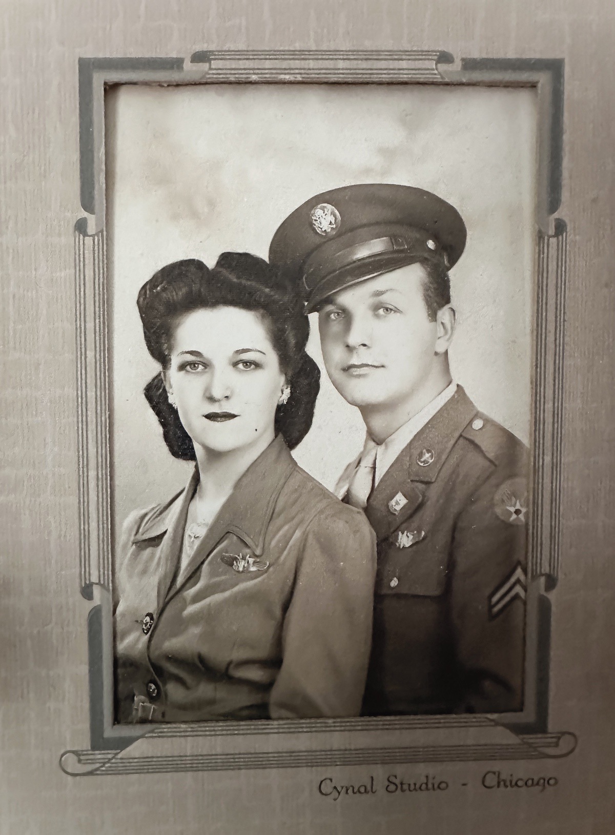 Mildred and Charles Krupsky pose in 1944: Mildred wearing a United States Post Office uniform, Charles in his U.S. Army Air Forces uniform. When Charles was drafted in 1944, Mildred took over his job at the Post Office so he wouldn’t lose his position while he was on active duty.