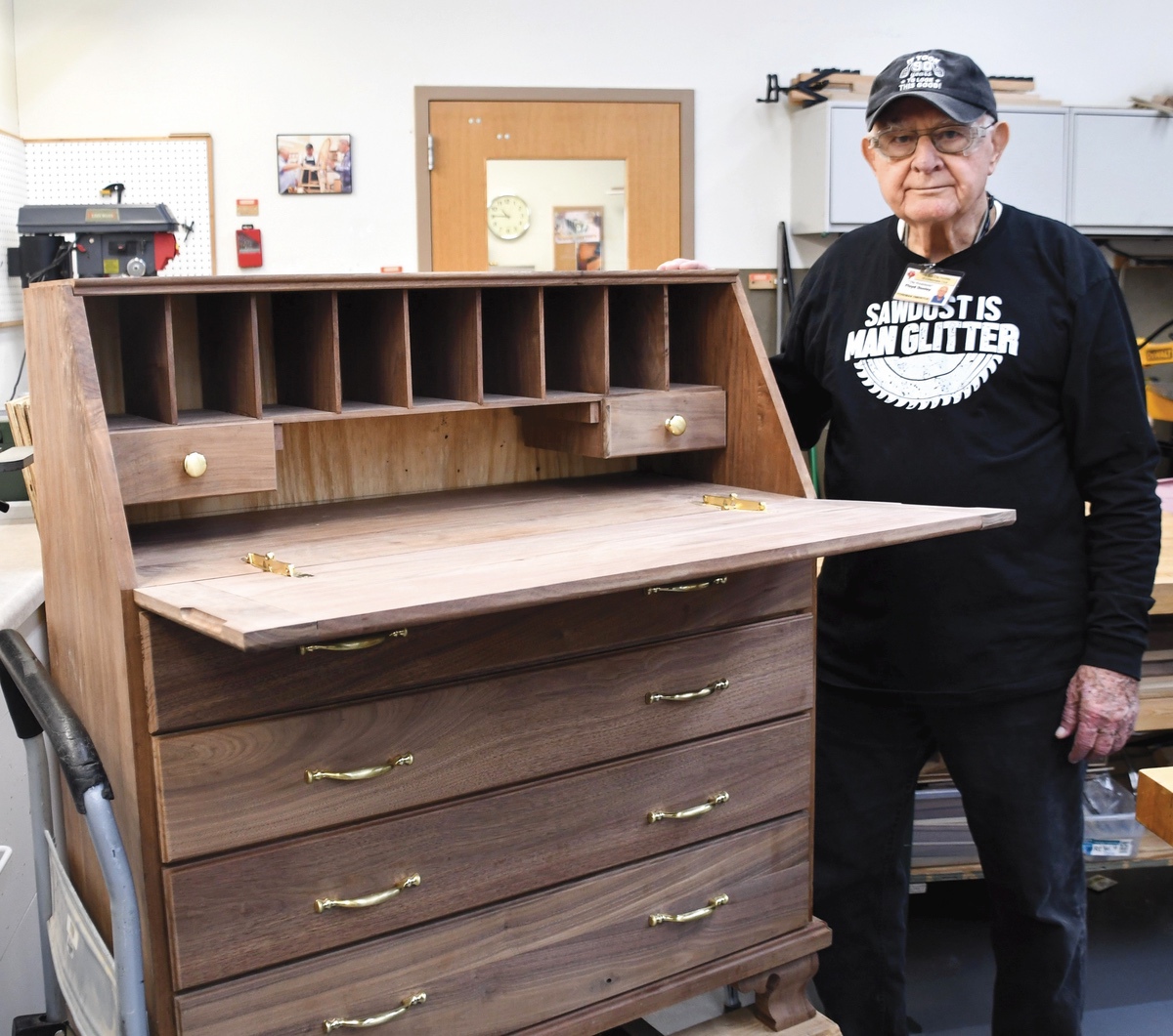 Floyd Donley started this secretary desk as a gift to his wife in 1962, but available time kept him from its completion. Over 60 years later, Donley, now 90, finished this heirloom-quality piece. (Photo by Christine Such/My Sun Day News)