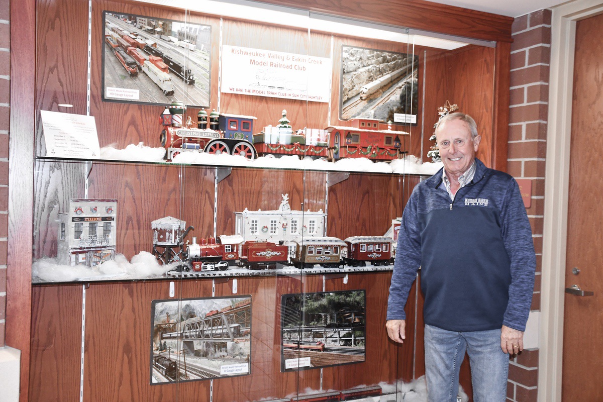 Model Railroad Club Member Mark Flodin with his winter train display inside Village Hall. (Photo by Christine Such/My Sun Day News)