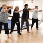 Grandmaster Gedo Chang (black gi) leads the Hapkido class, with daughter Laura Paarmann on the far right. (Photo by Christine Such/My Sun Day News)