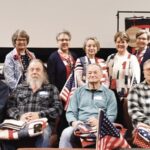 Recipients of the Valor Quilts featured here with the quilters on April 21, 2025. (Photo by Christine Such/My Sun Day News)