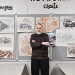 Jim Gruber stands before some of his artwork displayed in the Pencil and Palette art room. Always inspired, Gruber is never without his sketch pad. (Photo by Christine Such/My Sun Day News)