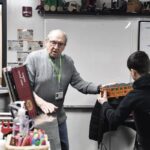 Dale Svoboda, Model Railroad Charter Club President shares his passion with engineering students at Huntley High School. (Photo by Christine Such/My Sun Day News)