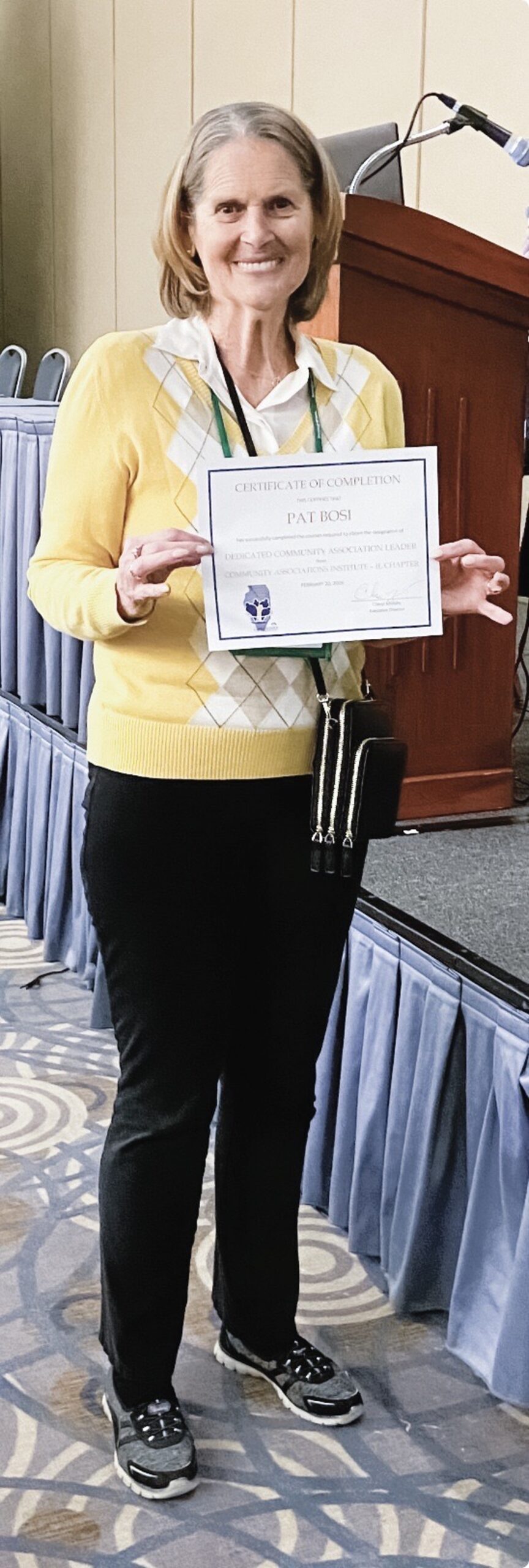 Sun City resident Pat Bosi receives her Dedicated Community Association Leader Certification. (Photo provided)
