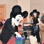 In costume, Sun City resident Jim Fatigato (pictured out of costume on page 4) brings a little bit of the Magic Kingdom to GG&Me Halloween Bash. (Photo by Christine Such/My Sun Day News)
