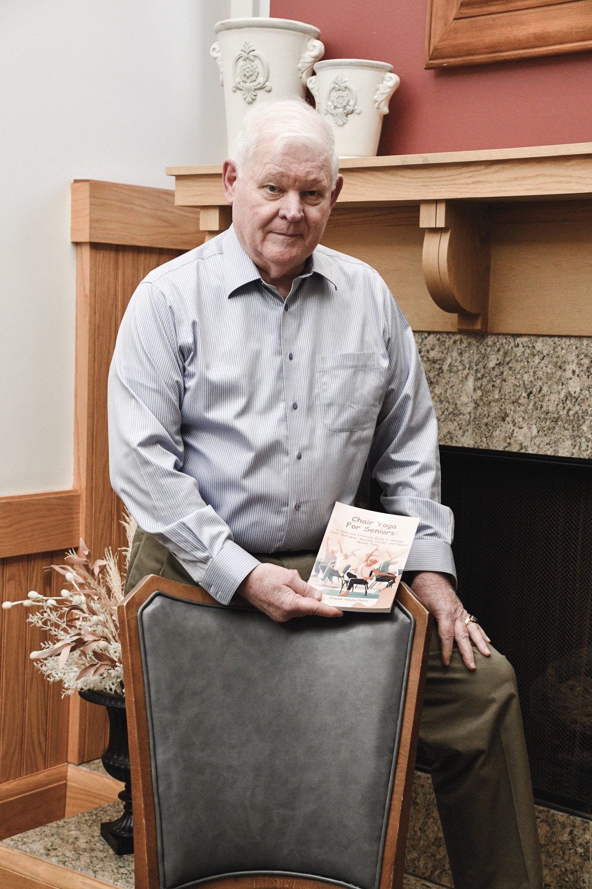 It’s Steve Ferry’s intent with his new book to keep seniors active and continue aging with energy, so take a seat and read and do some yoga, as his book suggests. (Photo by Christine Such/My Sun Day News)