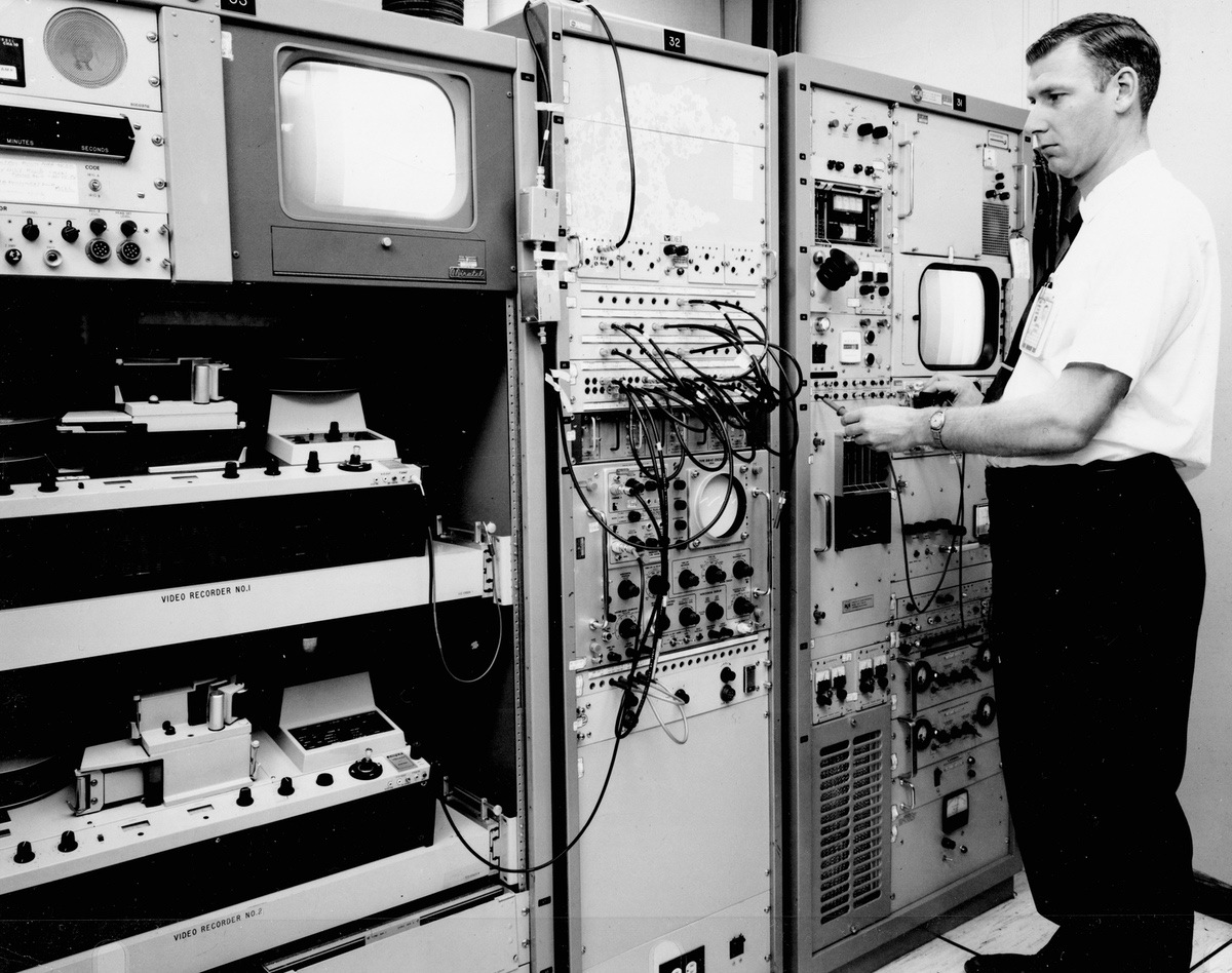Working as a GE Contractor, George Gawell operates controls of Apollo-era NASA technology for the Apollo 7 broadcast from space on October 14, 1968. (Photo provided)
