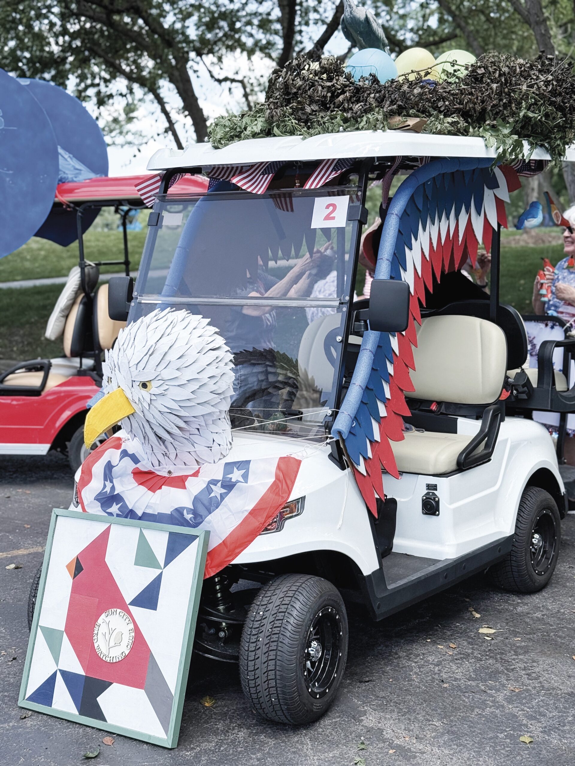 Each feather was cut and painted indvidually to make up the wingspan of The Eagle golf cart.