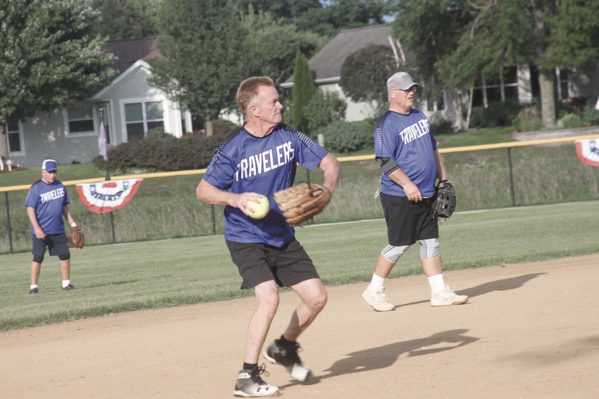Donn Smith of the Travelers fields a ground ball during a Sun City Softball League tournament game. (Photo by Steve Peterson/My Huntley News)