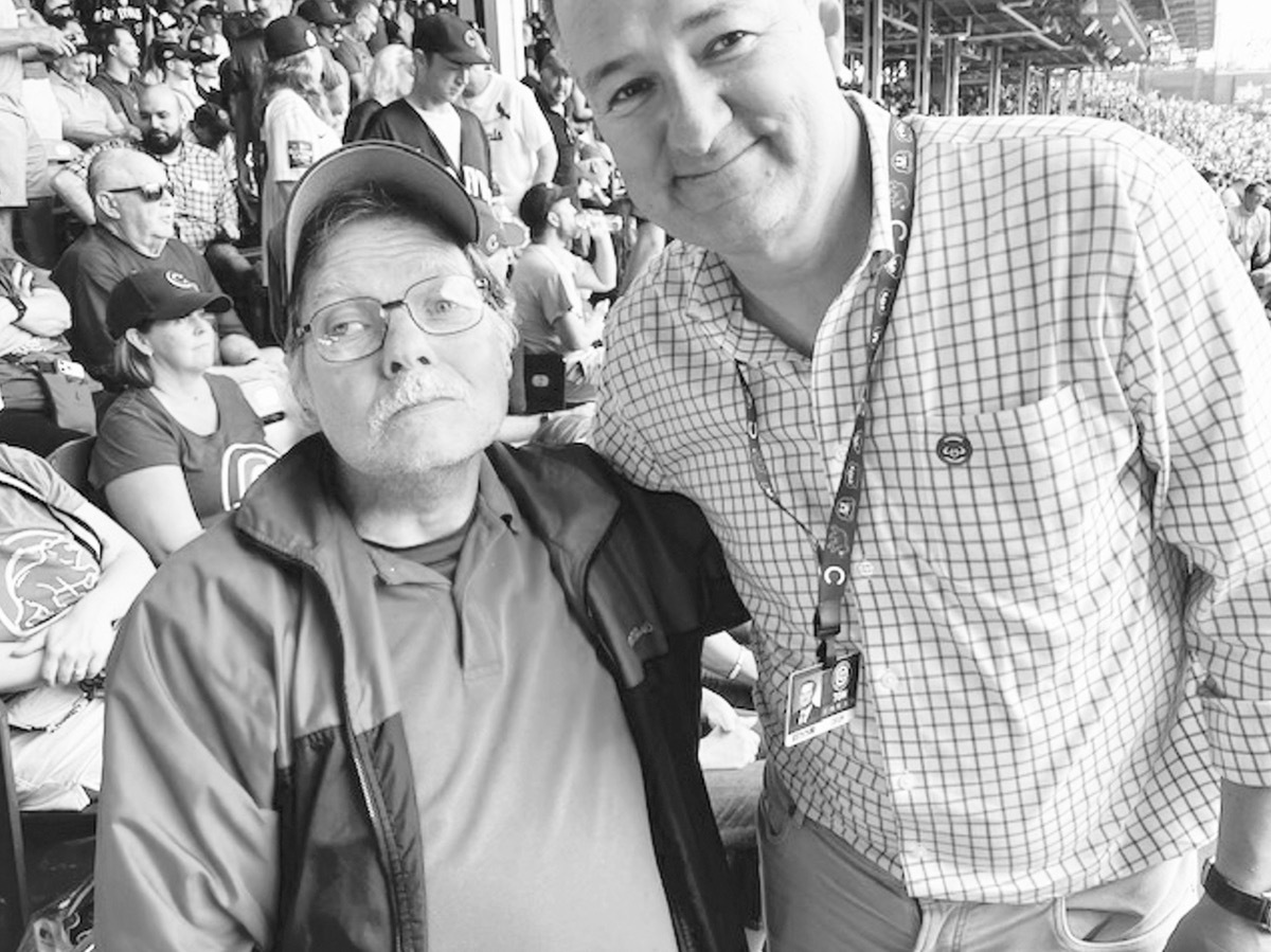 Although a White Sox supporter for one night with the White Sox Fan Club, Steve Peterson (L) is a lifelong Cubs fan, as seen here with Cubs owner Thomas Ricketts. (Photo provided)